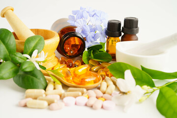 Alternative medicine herbal organic capsule with vitamin E omega 3 fish oil, mineral, drug with herbs leaf natural supplements for healthy good life.