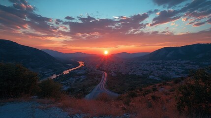 Scenic Sunset View Over Mountains with Urban Road