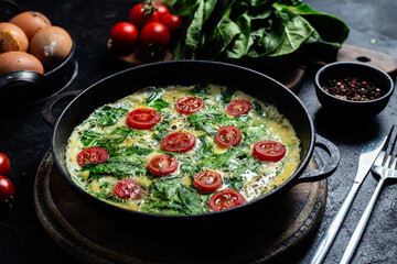 Delicious Homemade Spinach and Tomato Omelette in a Pan