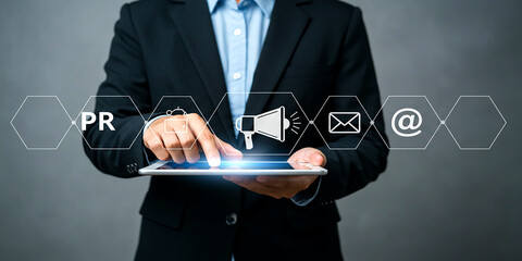 Businessman selecting digital icons representing public relations strategy and corporate communication
