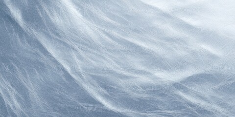 Cracked icy surface with subtle ridges and frosty texture in blue light
