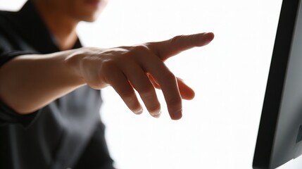 Obraz premium Developer Pointing at Computer Screen with White Background