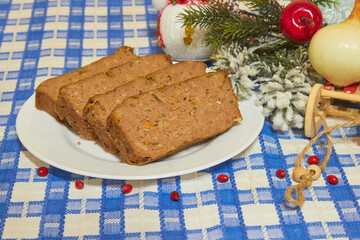 pieces of delicious pate on a white plate from liver, cold appetizer, The concept of healthy food,...