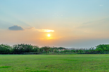 Green lawns and sunset views