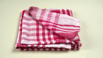 Clean sponge cloths with a checkered pattern isolated on white background. Household cleaning...
