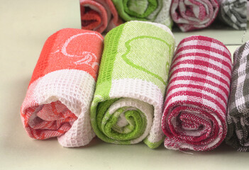 Clean sponge cloths with a checkered pattern isolated on white background. Household cleaning...