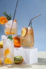 Summer cold cocktails with fruits and ice in glass glasses.
Advertising. Banner for bar