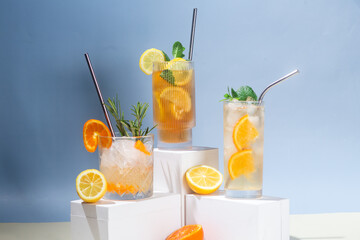 Summer cold cocktails with fruits and ice in glass glasses.
Advertising. Banner for bar