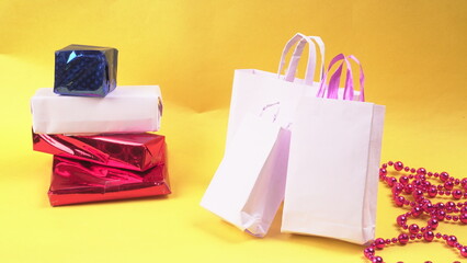 Gift box and bag made from craft paper the concept of handmade gift. Isolated background.
