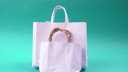 Gift box and bag made from craft paper the concept of handmade gift. Isolated background.
