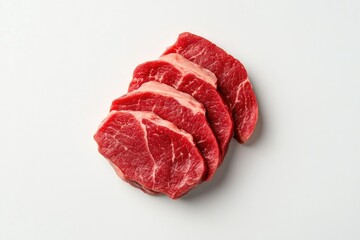 Obraz premium Fresh quality beef steaks arranged neatly on white background