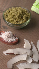 Coconut chutney in a bowl with raw coconut and green chilli ,Served with dosa, idli, vada