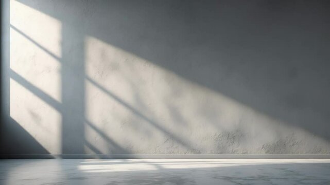Blank minimalist background in light dark gray with cement wall texture and light window shadow for product showcase.
