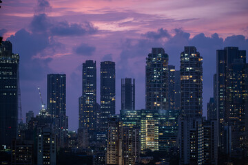 Cinematic view of Mumbai city at night. Mumbai's iconic financial district with this stunning cityscape view. Shot of Mumbai Skyline, high-rise buildings at South Mumbai, Maharashtra India.
