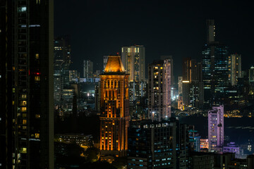Cinematic view of Mumbai city at night. Mumbai's iconic financial district with this stunning cityscape view. Shot of Mumbai Skyline, high-rise buildings at South Mumbai, Maharashtra India.