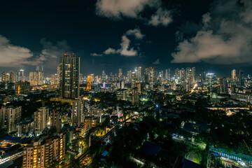 Cinematic view of Mumbai city at night. Mumbai's iconic financial district with this stunning cityscape view. Shot of Mumbai Skyline, high-rise buildings at South Mumbai, Maharashtra India.