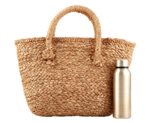 Stylish beach tote bag made of natural straw with sleek metal water bottle beside it, perfect for summer outings and beach trips. This combination is ideal for staying hydrated and fashionable
