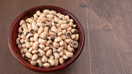 Uncooked black eyed peas. Health food concept.