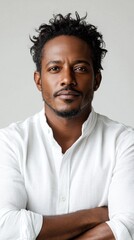 Fototapeta premium Portrait of a Confident Man in a White Shirt
