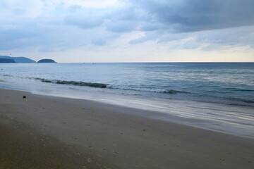 Karon beach in the evening, Phuket, Thailand. Cloudy weather.