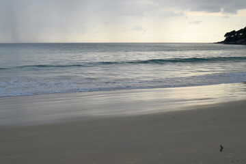 Karon beach in the evening, Phuket, Thailand. Cloudy weather.