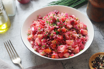 A bowl with Vinegret salad, a typical Russian dish	