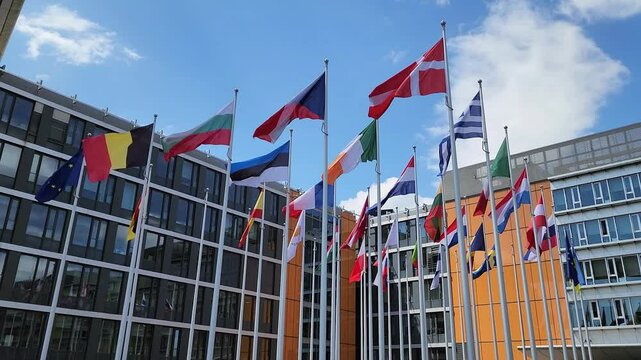EU members flags waving in front of a building in Luxembourg