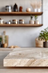 Marble countertop in modern kitchen interior design with wooden shelves and decor in background