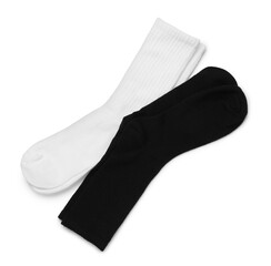 Pairs of stylish socks isolated on white, top view
