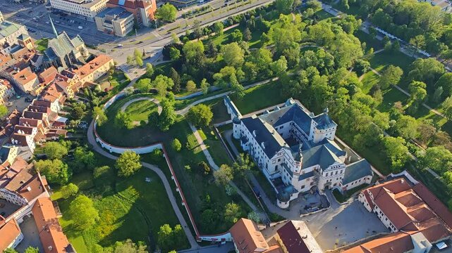 Pardubice castle on a hill with city center in background, beautiful aerial panorama capturing urban and historic landscape.