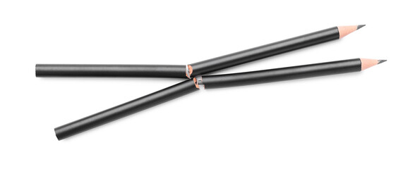 Broken graphite pencils isolated on white, top view