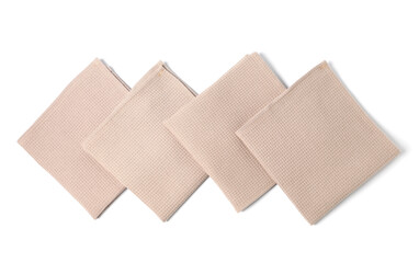 Many clean waffle towels isolated on white, top view