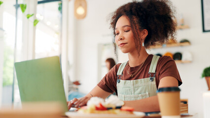Laptop, remote work and woman typing in cafe with social media marketer for ad campaign, project and email. Computer, freelancer and writing on internet in coffee shop for brand promotion online