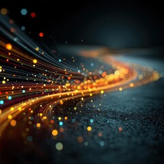 Abstract digital flow of energy and light trails across a dark surface.  Dynamic lines of vibrant color and glowing particles create a sense of movement and technology