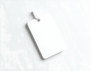 Blank price tag hanging on white isolated background
