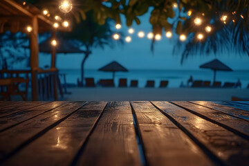 Empty wooden table with blurred beach bar at night