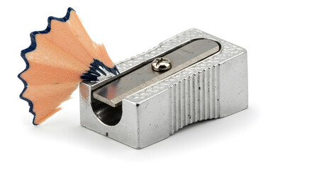 Close Up of a Silver Pencil Sharpener with Wooden Shaving on White Background