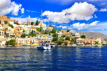 Gordijnen Traditional colorful Greek island- beautiful Chalki (Halki)  in Dodecanese. Greece travel © Freesurf