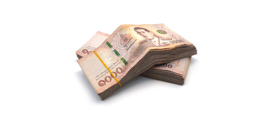 1.000 baht banknotes stacked on a white background. Finance and currency concept. Exchange rate.