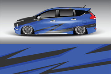 Sleek blue modified car with striking graphics