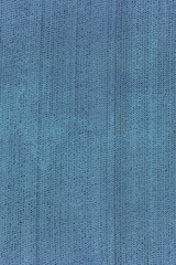 Old grid painted with blue paint. Retro industrial background.