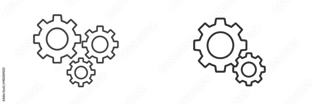 Fototapete Different sizes of interlocking gears symbolizing teamwork and mechanical processes in engineering settings