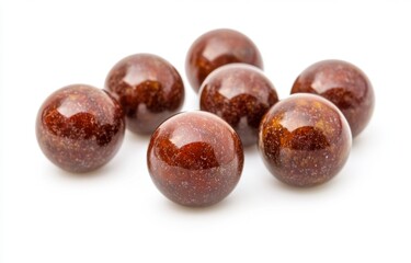 Brown glossy marble balls on white background with reflections