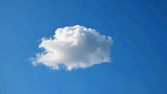 Cloudscape photography: single white cloud in a blue sky background for weather and nature lovers