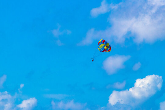 Paragliding with boat in the Caribbean in Mexico.