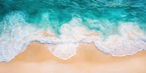 Obraz premium Serene Aerial View of Turquoise Ocean Waves and Sandy Shoreline