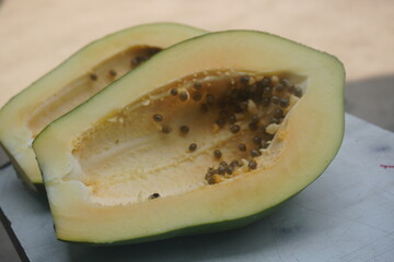 Papaya is a tropical fruit with sweet, orange flesh, rich in vitamins, enzymes, and antioxidants, promoting digestion and health.
