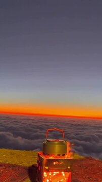 Traditional Tea Brewing Above the Clouds at Sunrise in Saudi Arabia