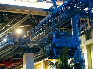 the cabin leaves the cable car parking lot, climbing up the cables. The technical elements are...