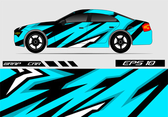 Obraz premium Stylish blue and black car wrap design showcasing speed